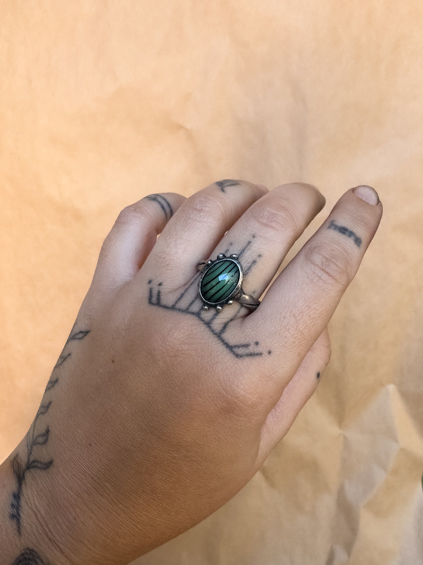 baubled green jester ring