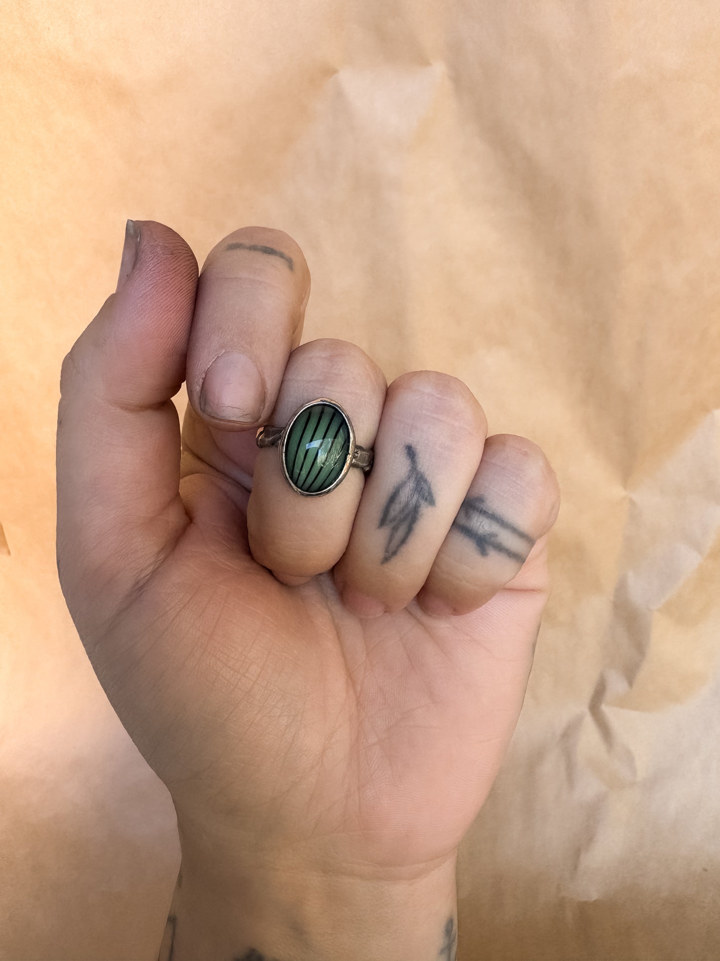 green jester ring