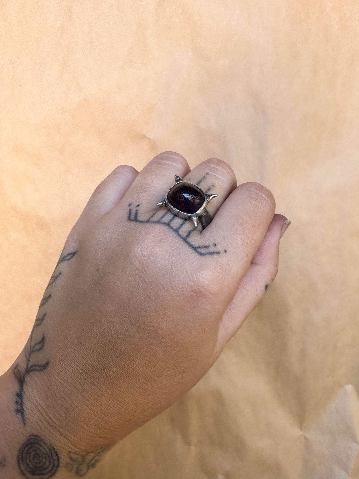 purple spiked ring