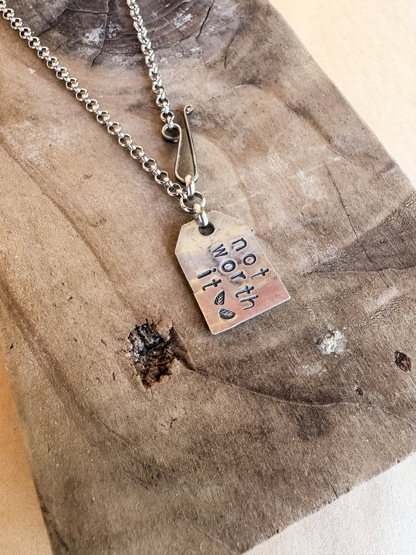 not worth it tag necklace