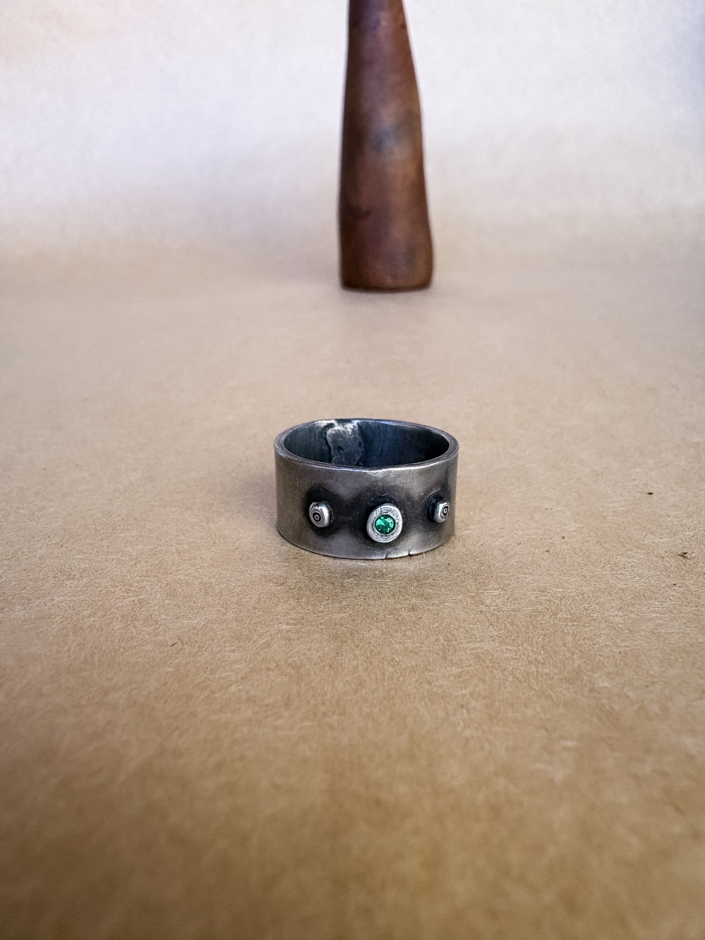 grassy gem wide band ring