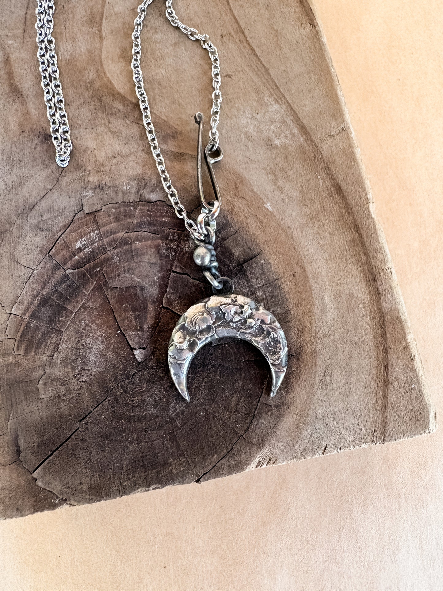 swinging crescent moon necklace