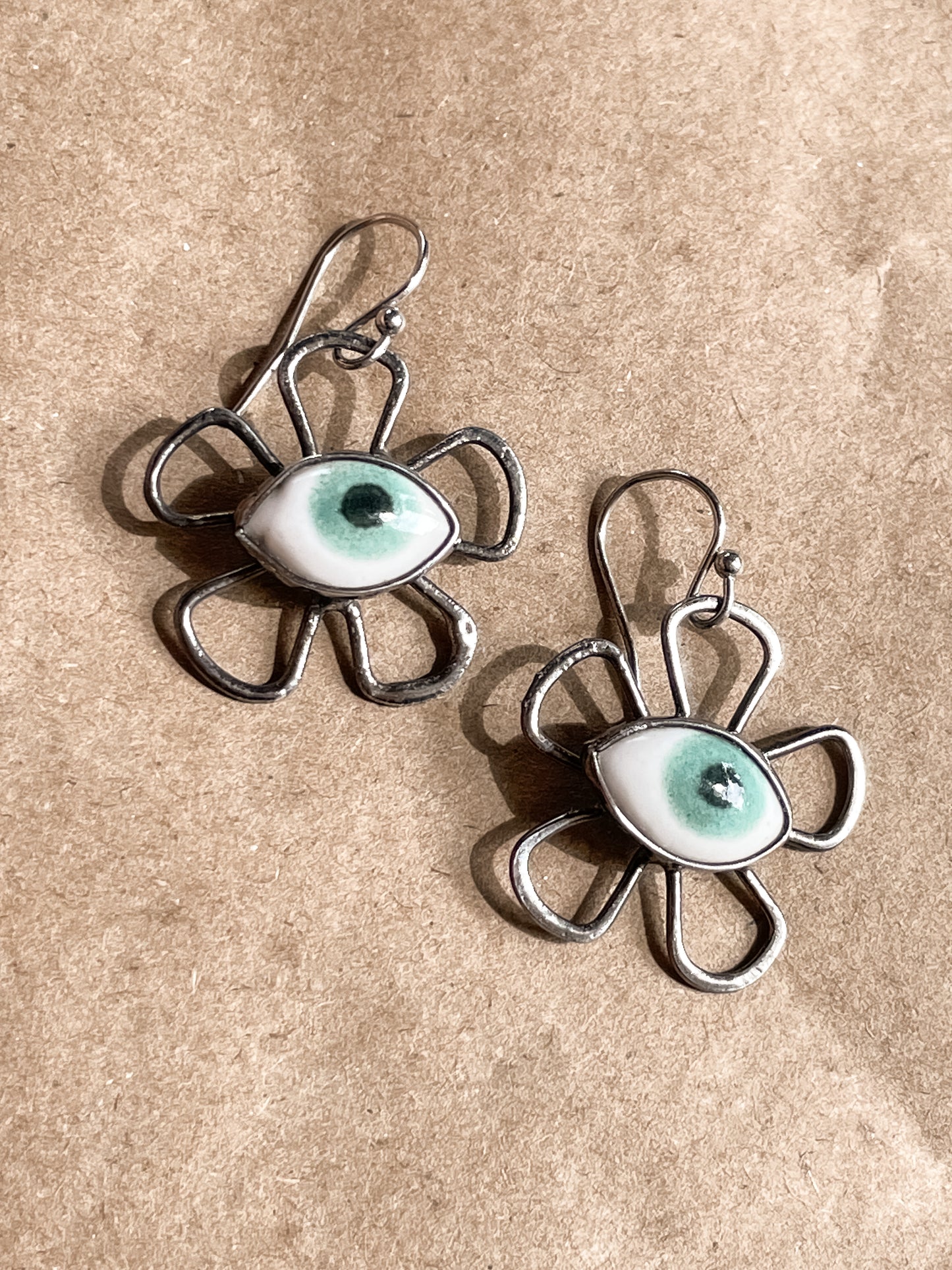 flower eye earrings