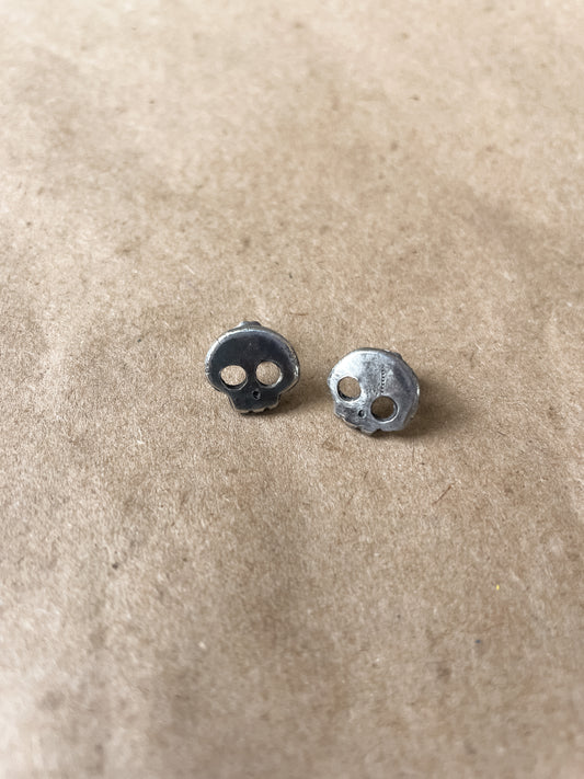 carved skull stud earrings
