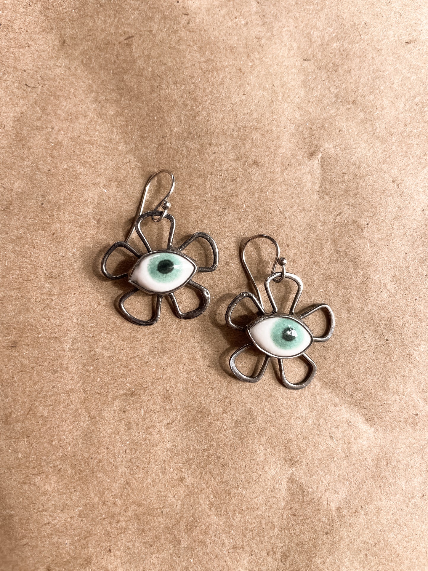 flower eye earrings