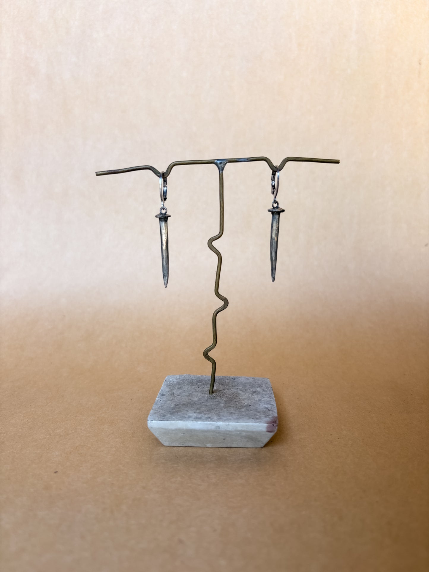 nail earrings