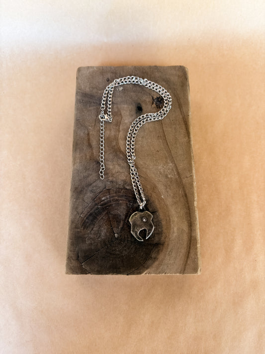 pinky tooth gem necklace