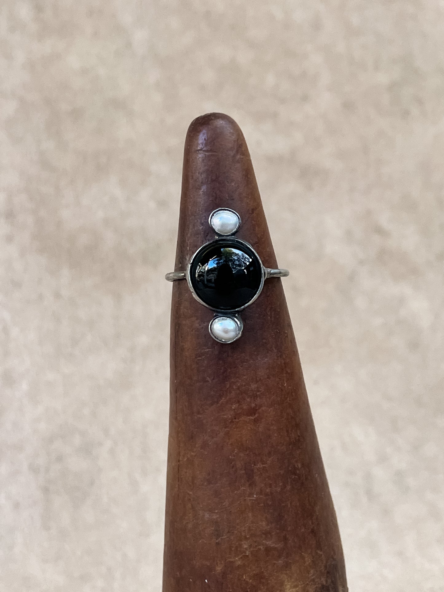 black & pearl ring