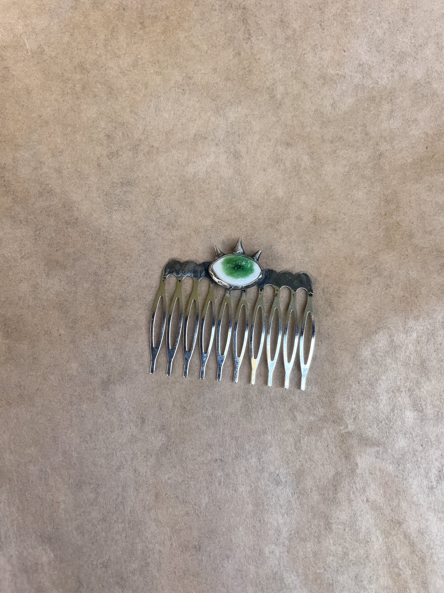 green eye hair comb