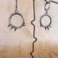 spiked portal earrings