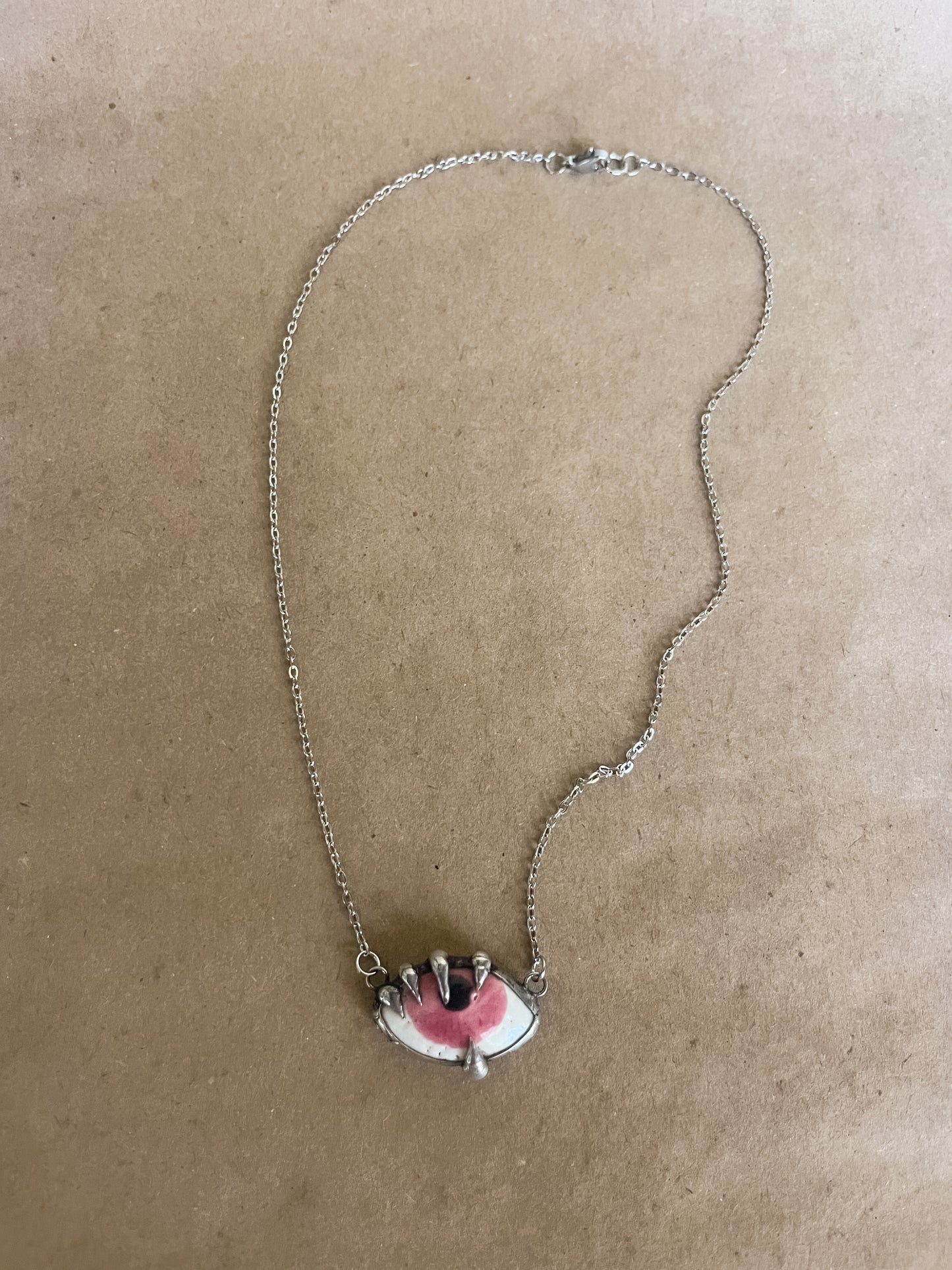 clutcher eye necklace