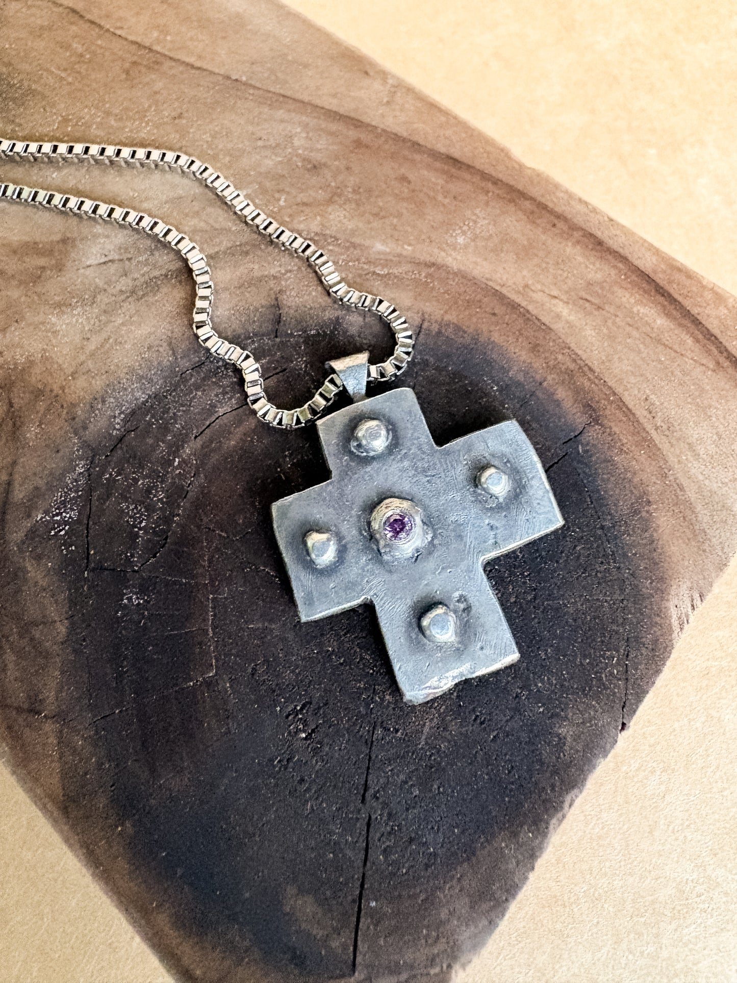 purple studded cross necklace