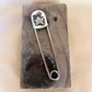 star swirl safety pin