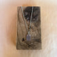 not worth it tag necklace