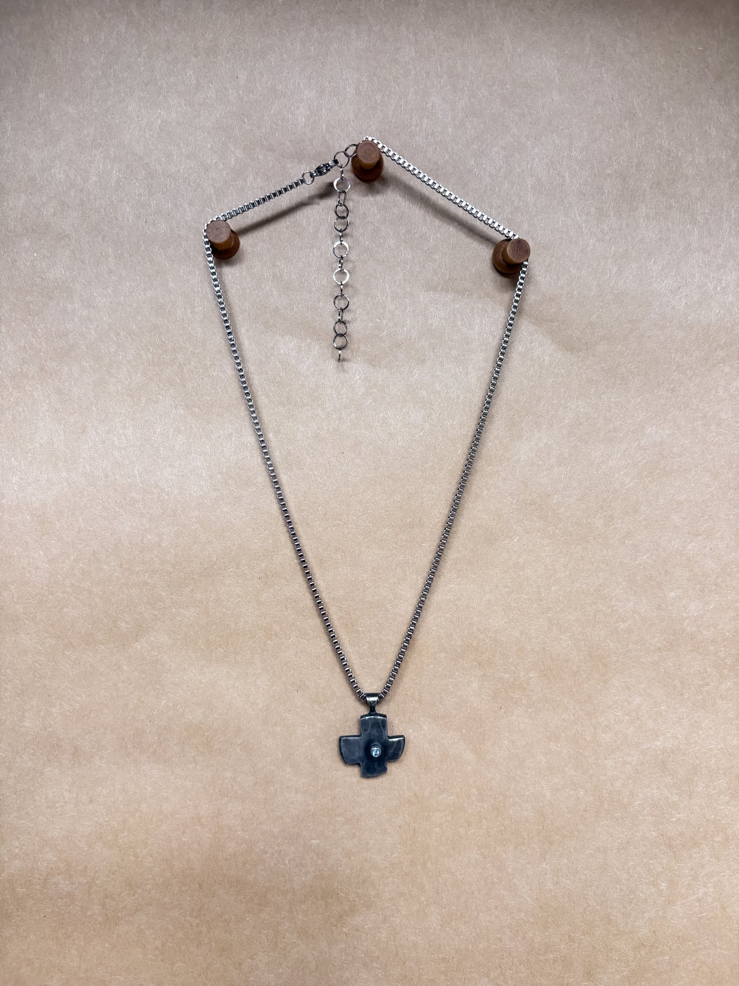 blue gemmy cross necklace
