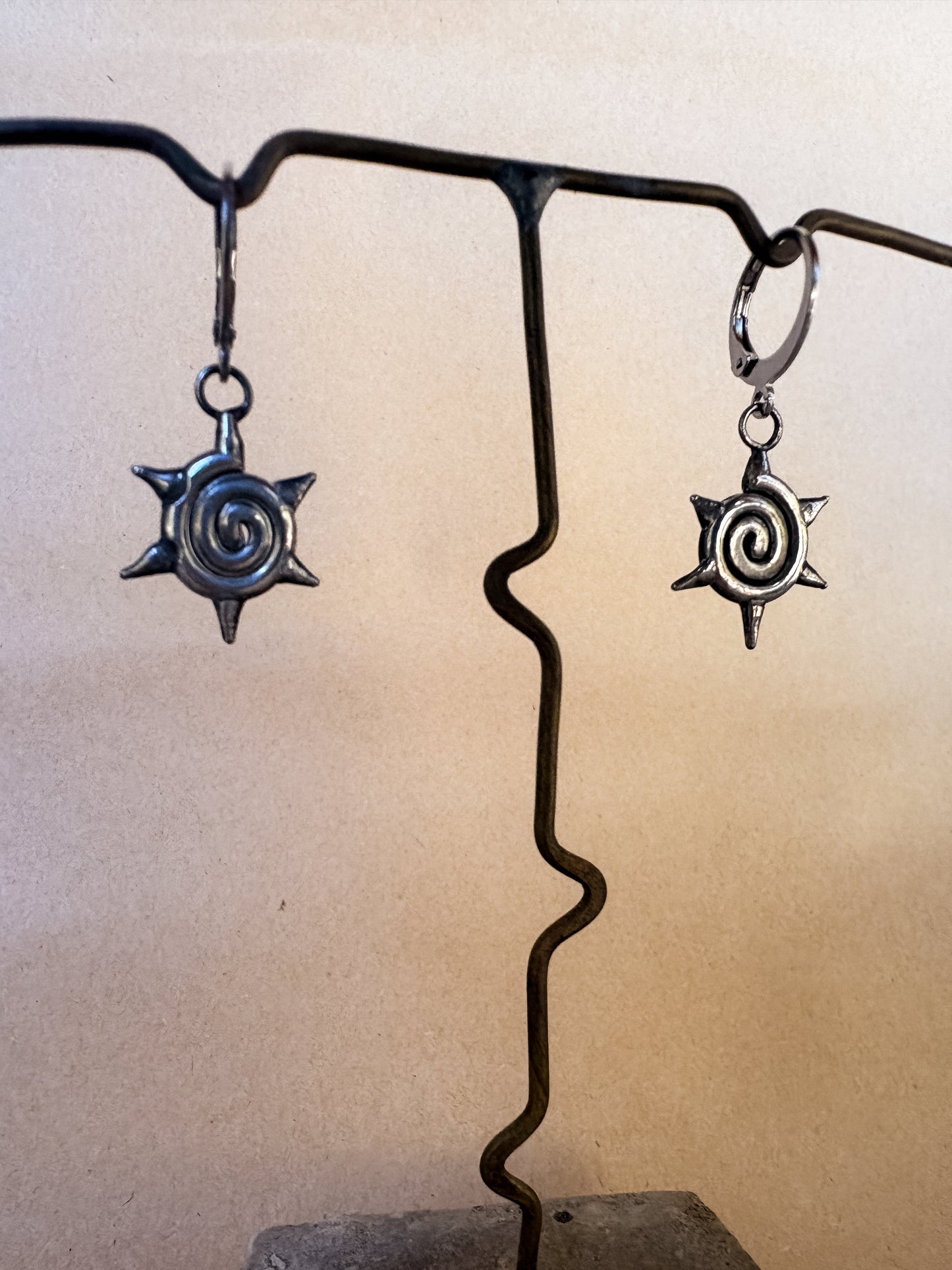 swirl spike earrings