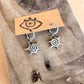 swirl spike earrings
