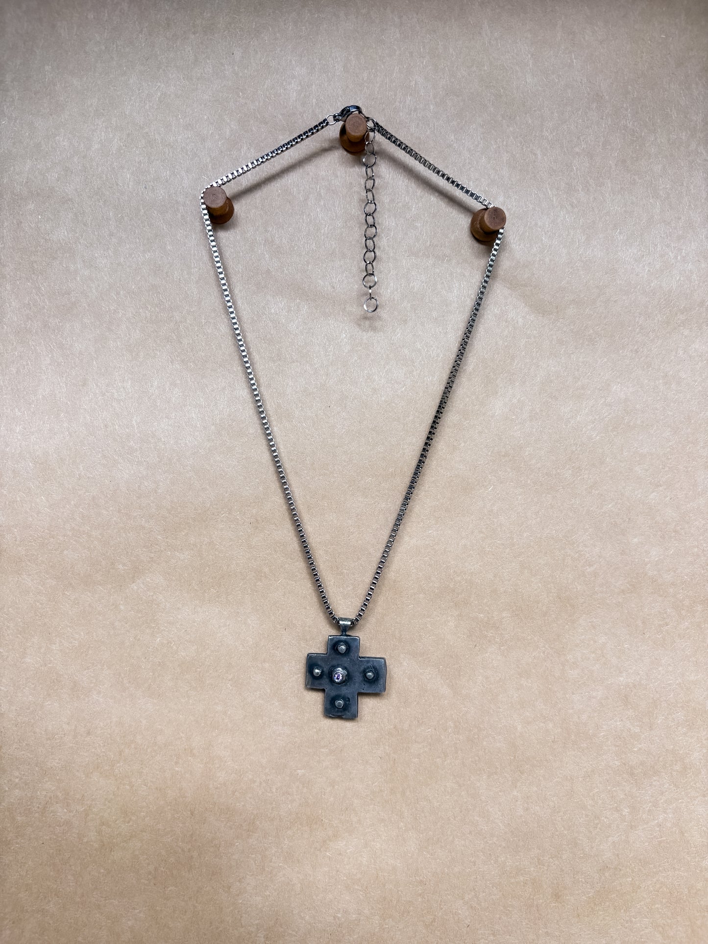 purple studded cross necklace