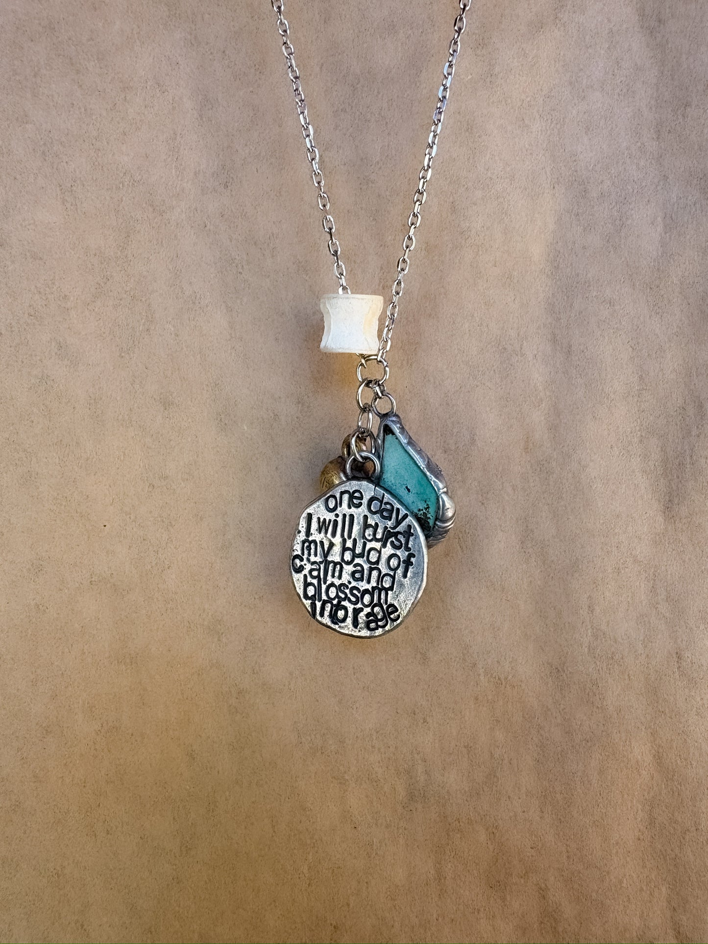 rage charm necklace