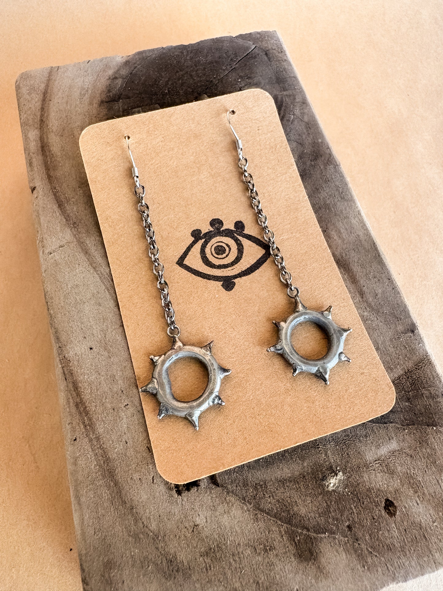 sun portal long earrings