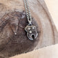 triple yellow tooth gem necklace