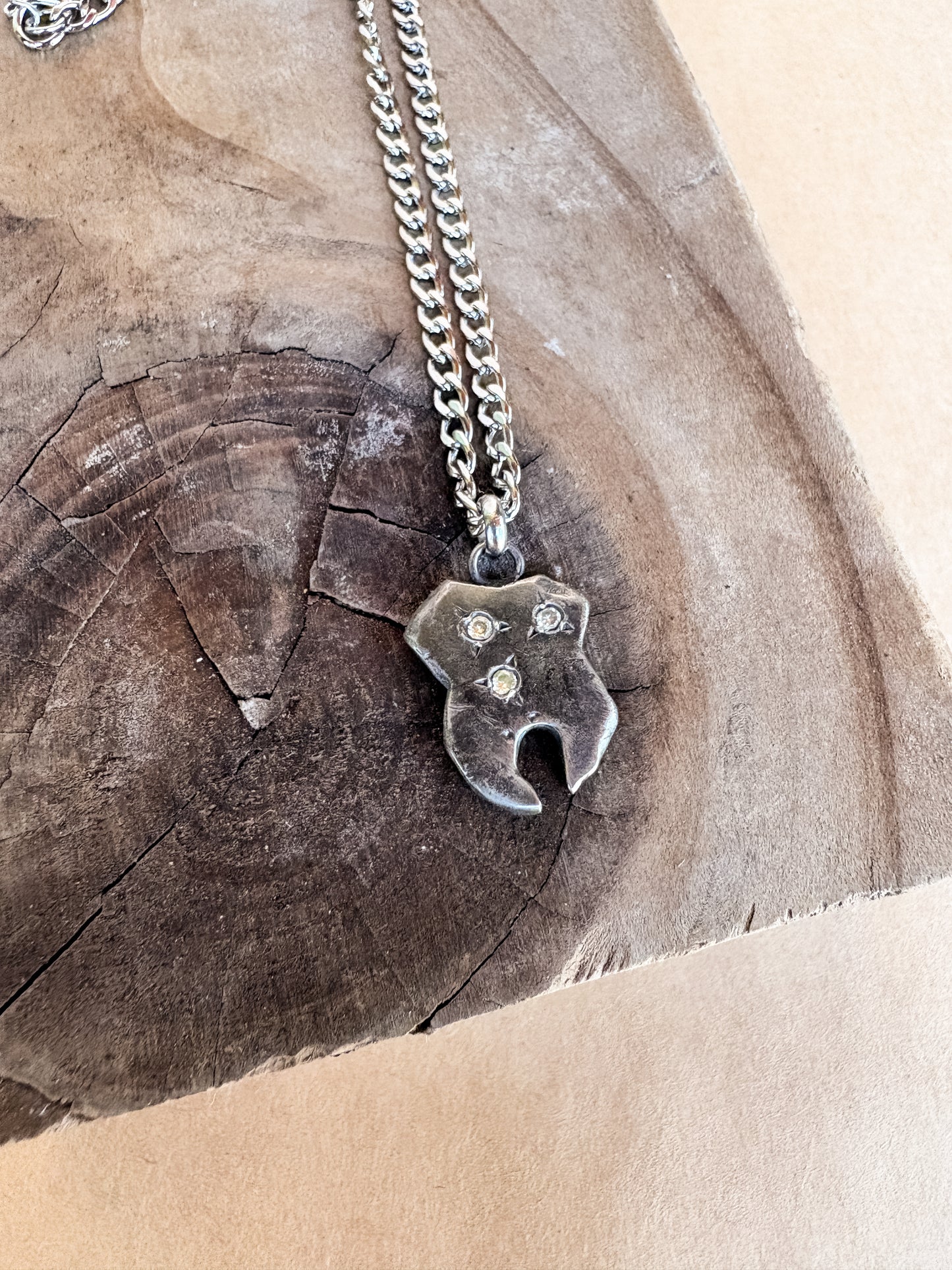triple yellow tooth gem necklace