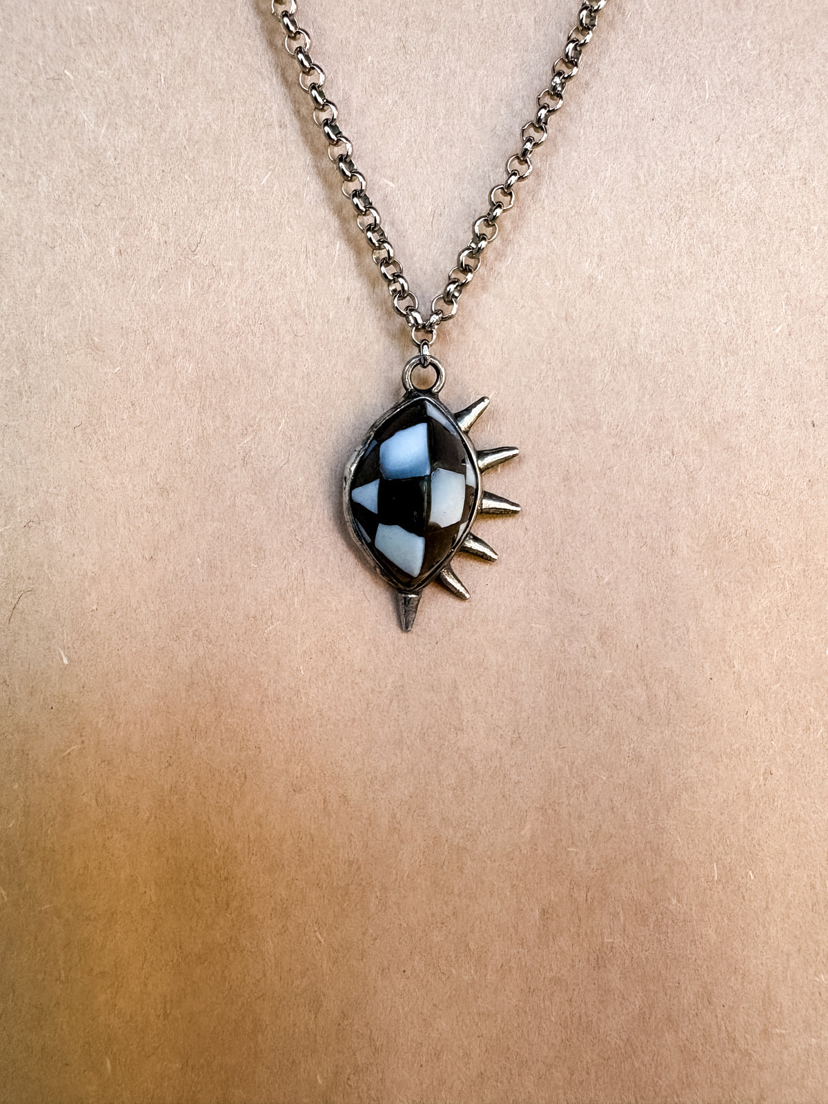 checkerboard spike necklace