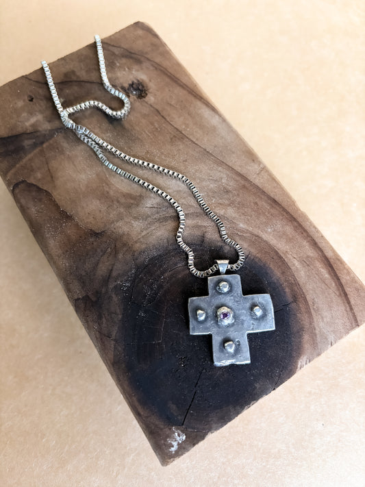 purple studded cross necklace
