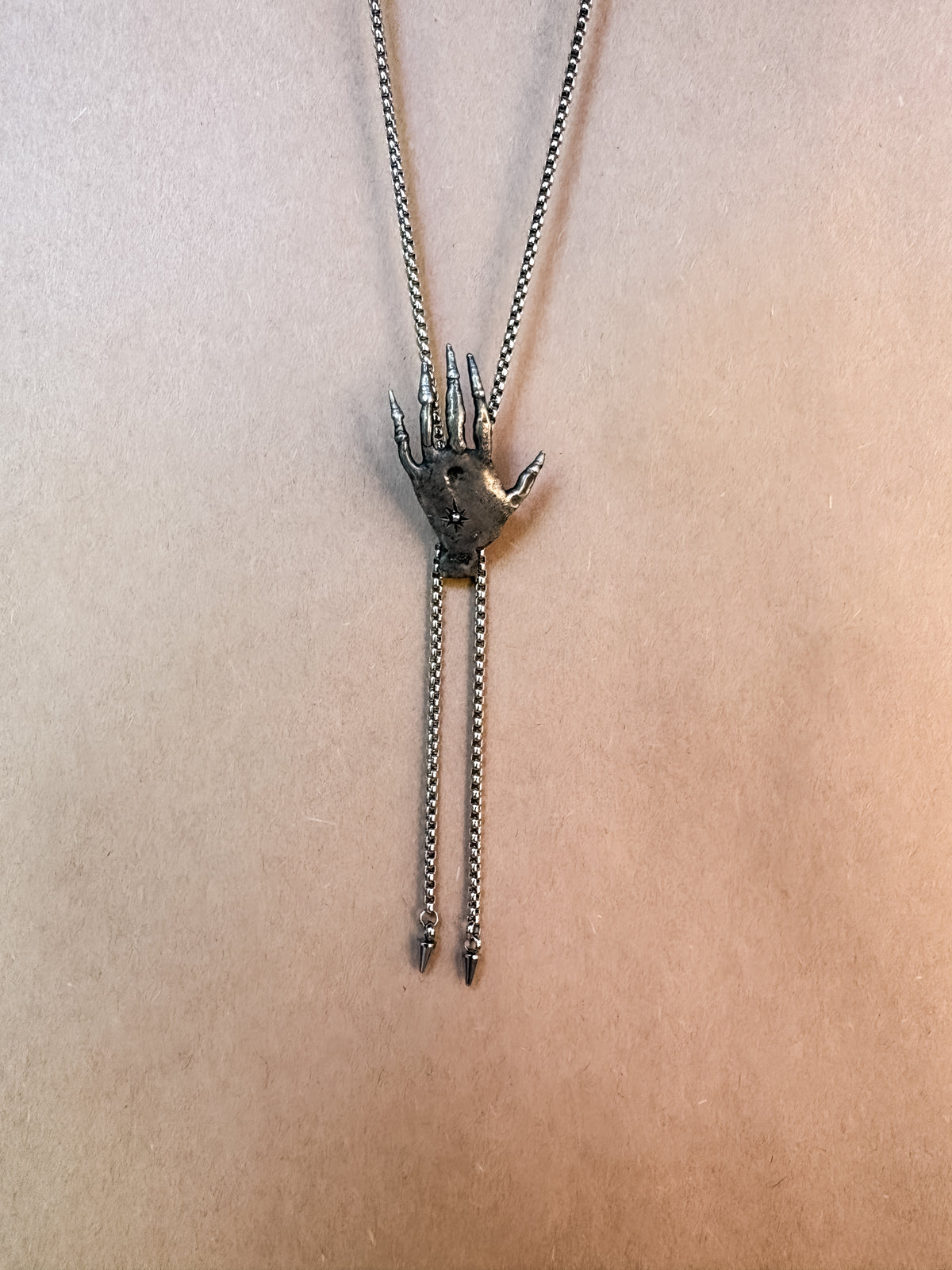 spell hand chain bolo