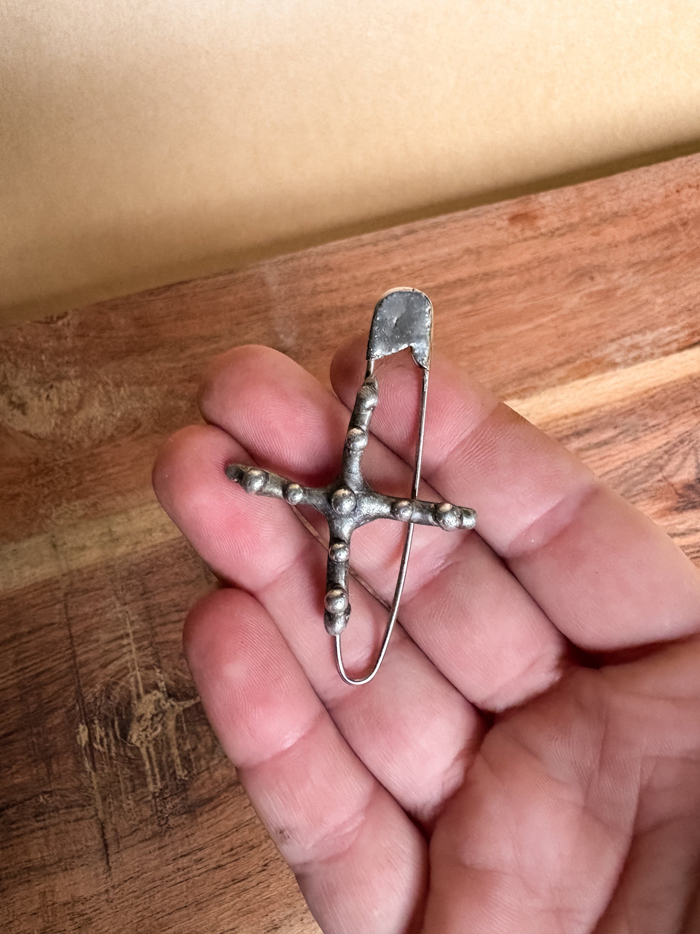 studded cross brooch pin