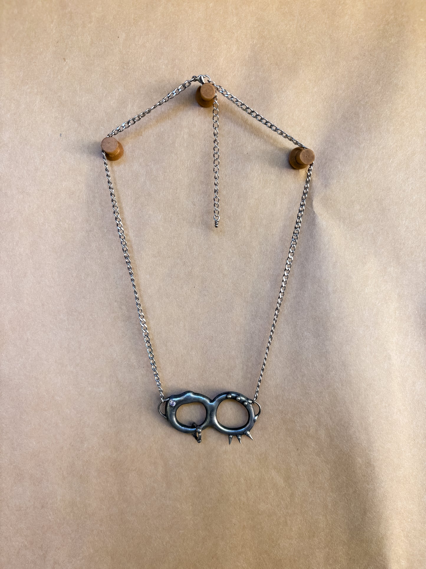 infinity pink junk pendant