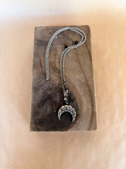swinging crescent moon necklace