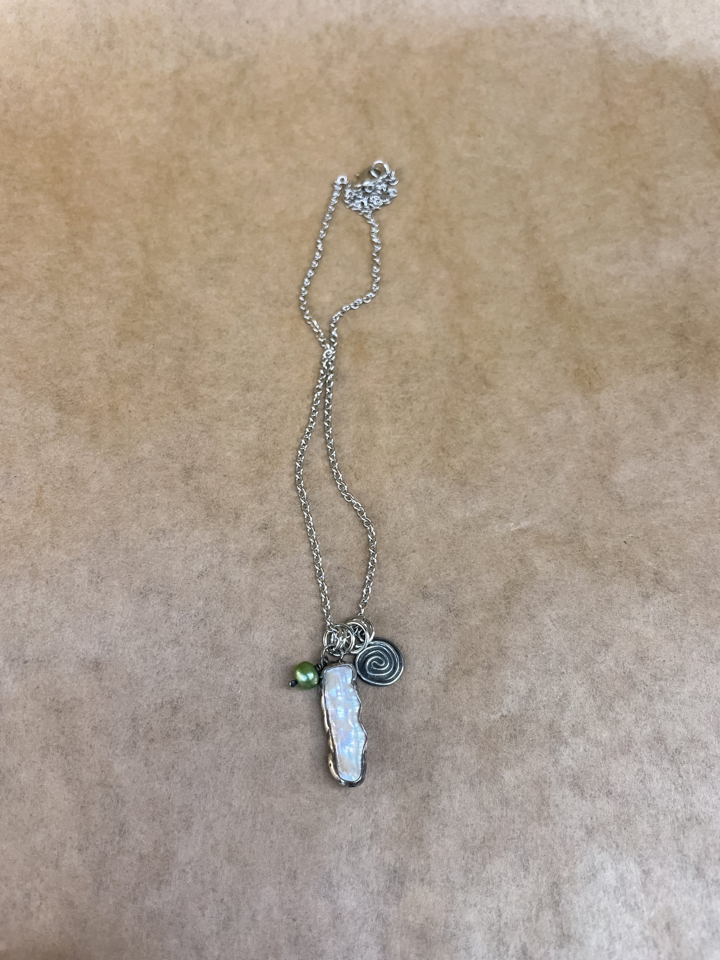 pearl swirl charm necklace