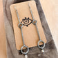 garnet sigil earrings