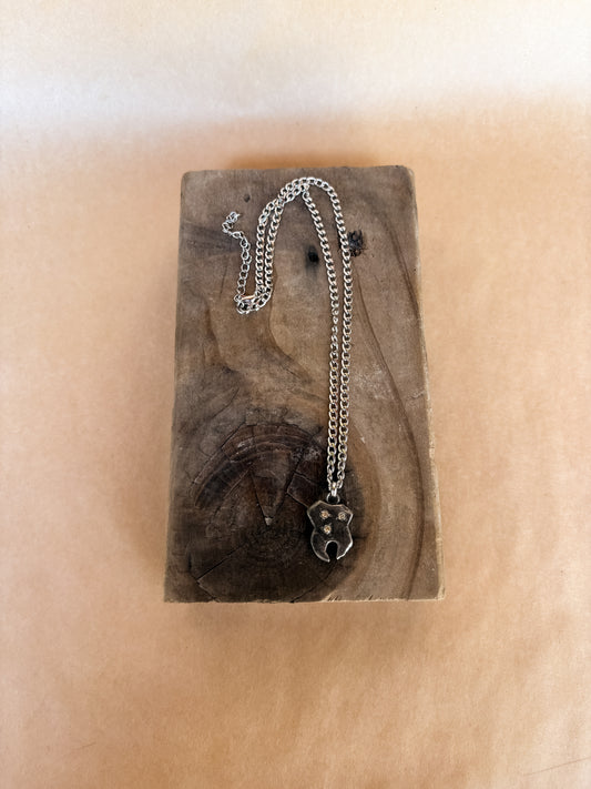 triple yellow tooth gem necklace