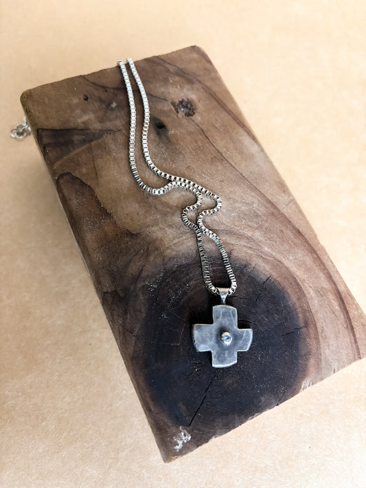 blue gemmy cross necklace