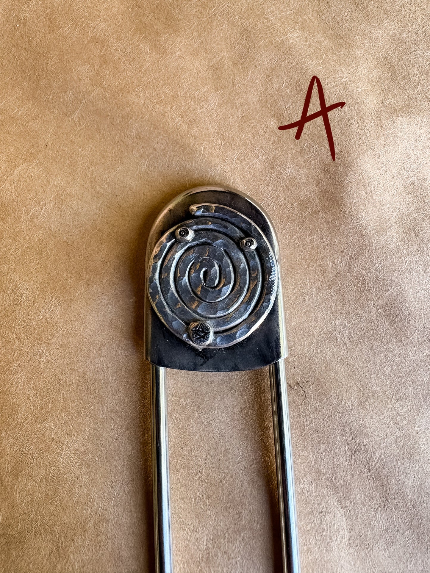 cosmic spiral safety pin