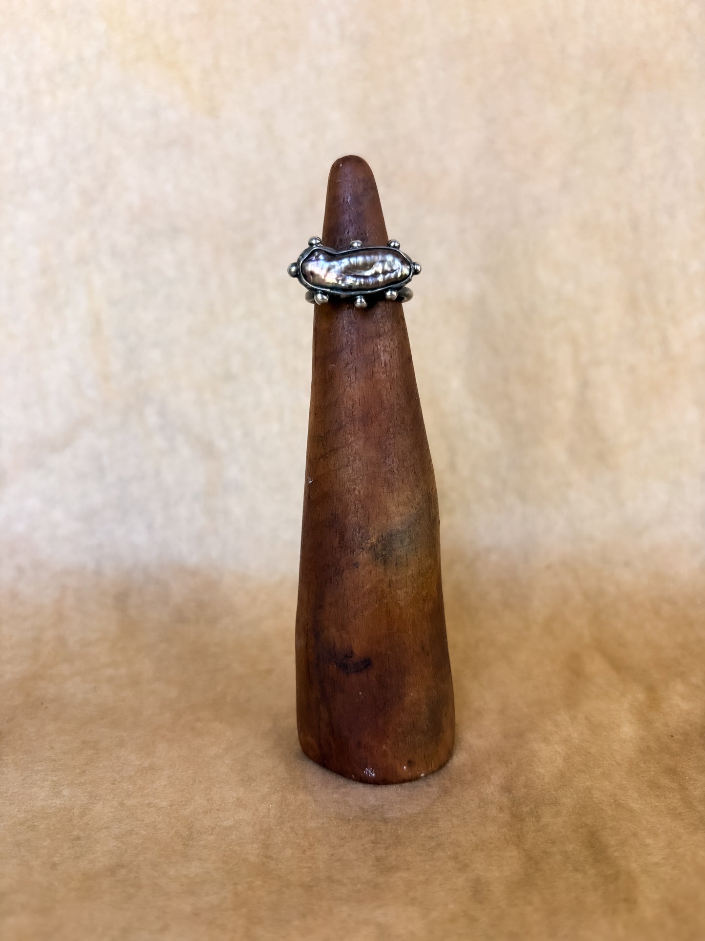 black pearl bar ring