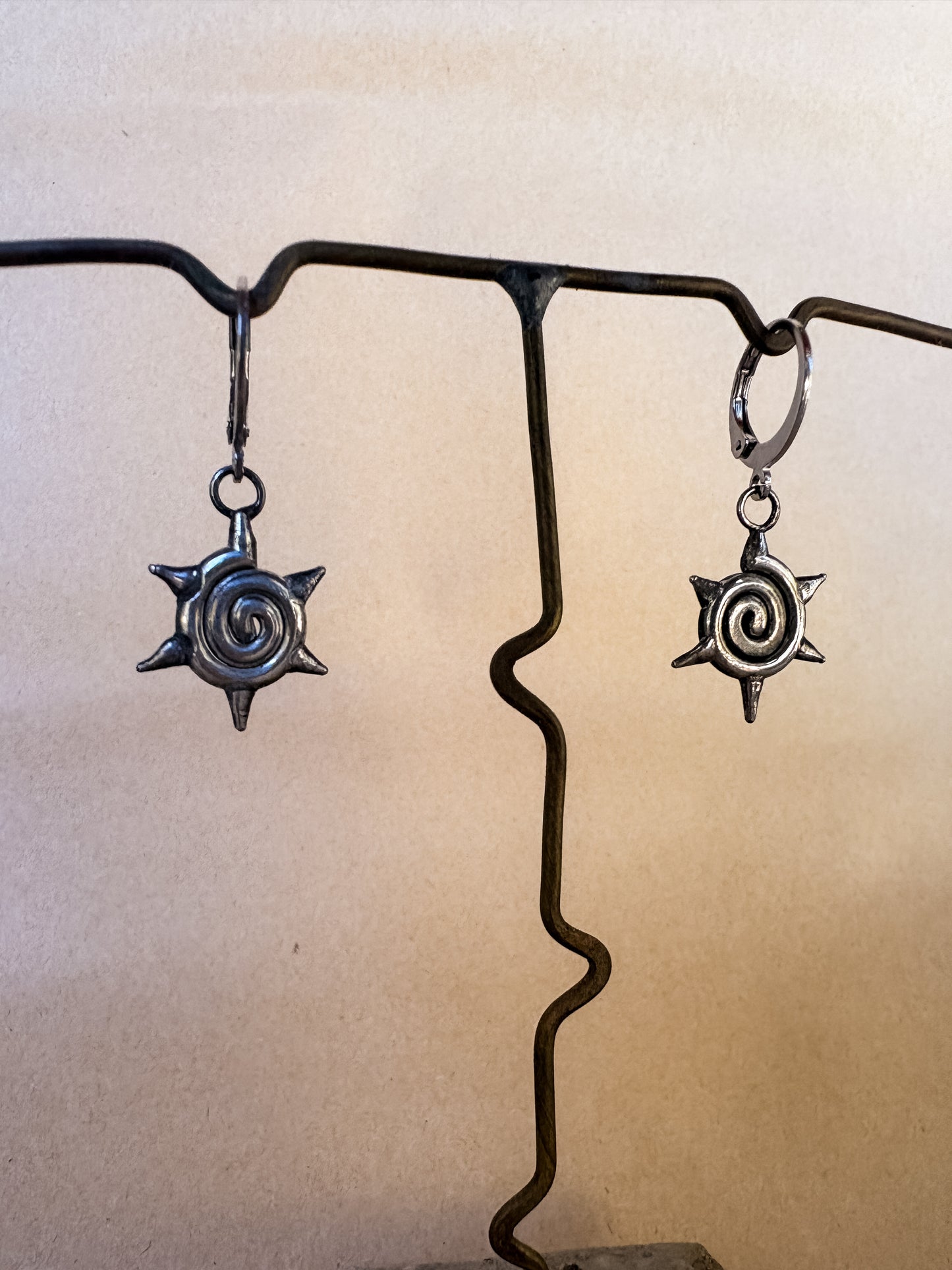 swirl spike earrings