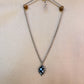 checkerboard spike necklace