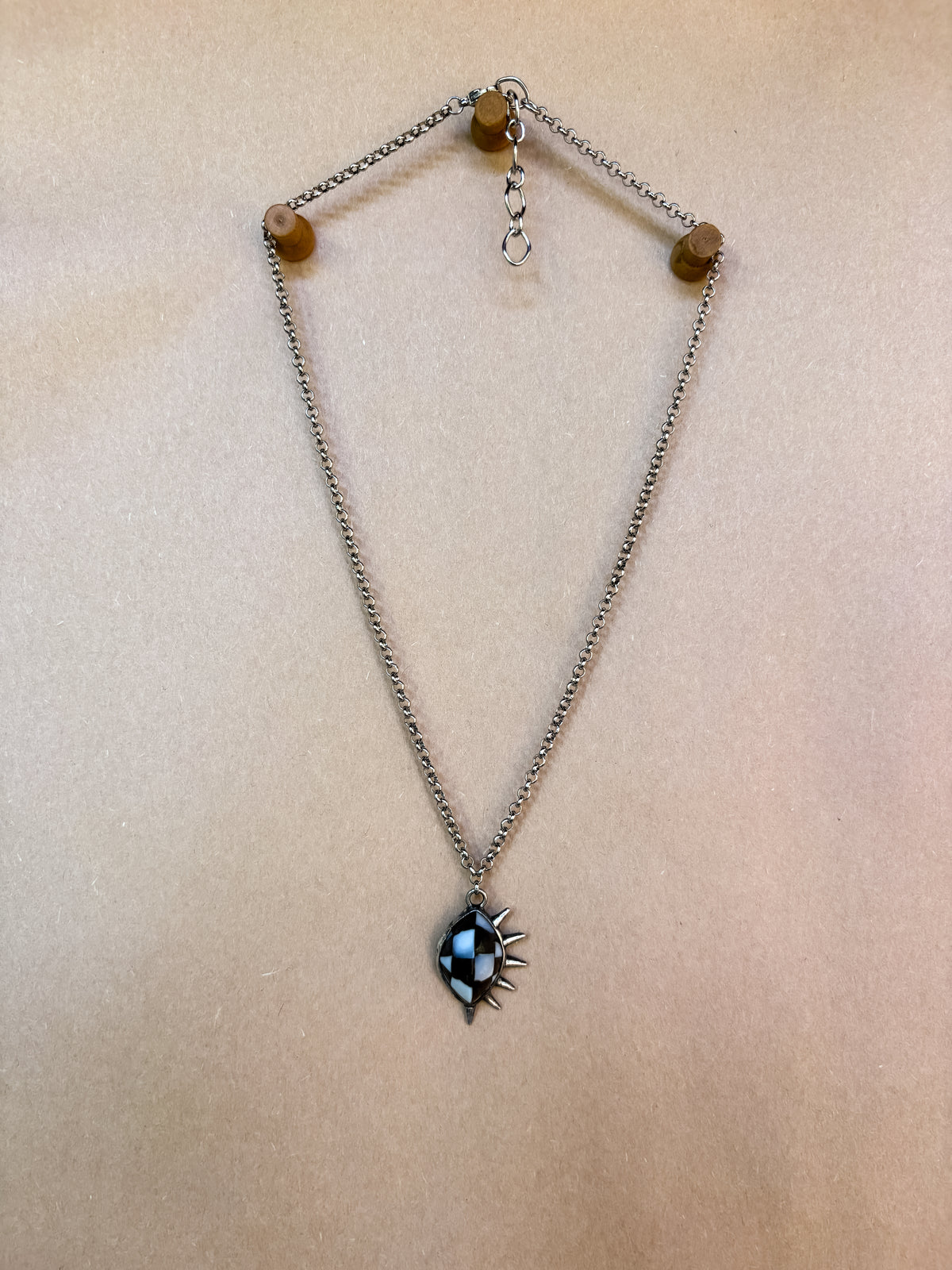 checkerboard spike necklace