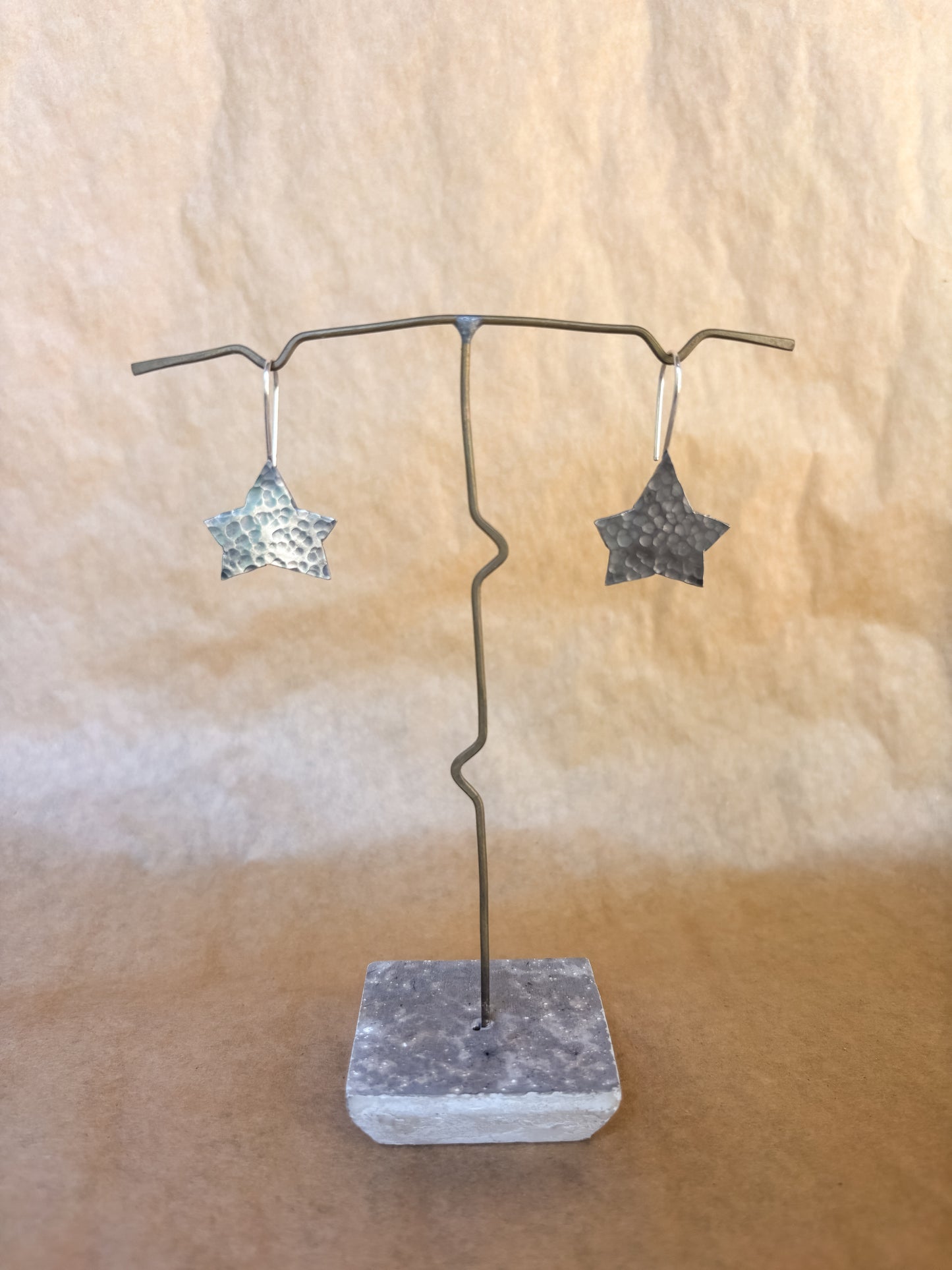 broad star earrings