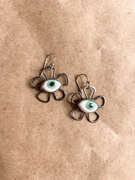 flower eye earrings